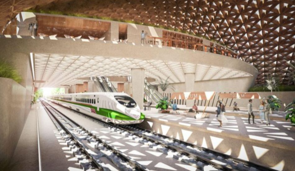 Interior view of the Tulum Tren Maya station with modern design and passengers