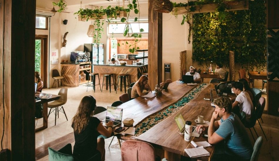 Digital Jungle Tulum coworking café with digital nomads working in a tropical setting