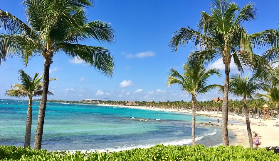 eco-friendly homes Riviera Maya with ocean views and palm trees
